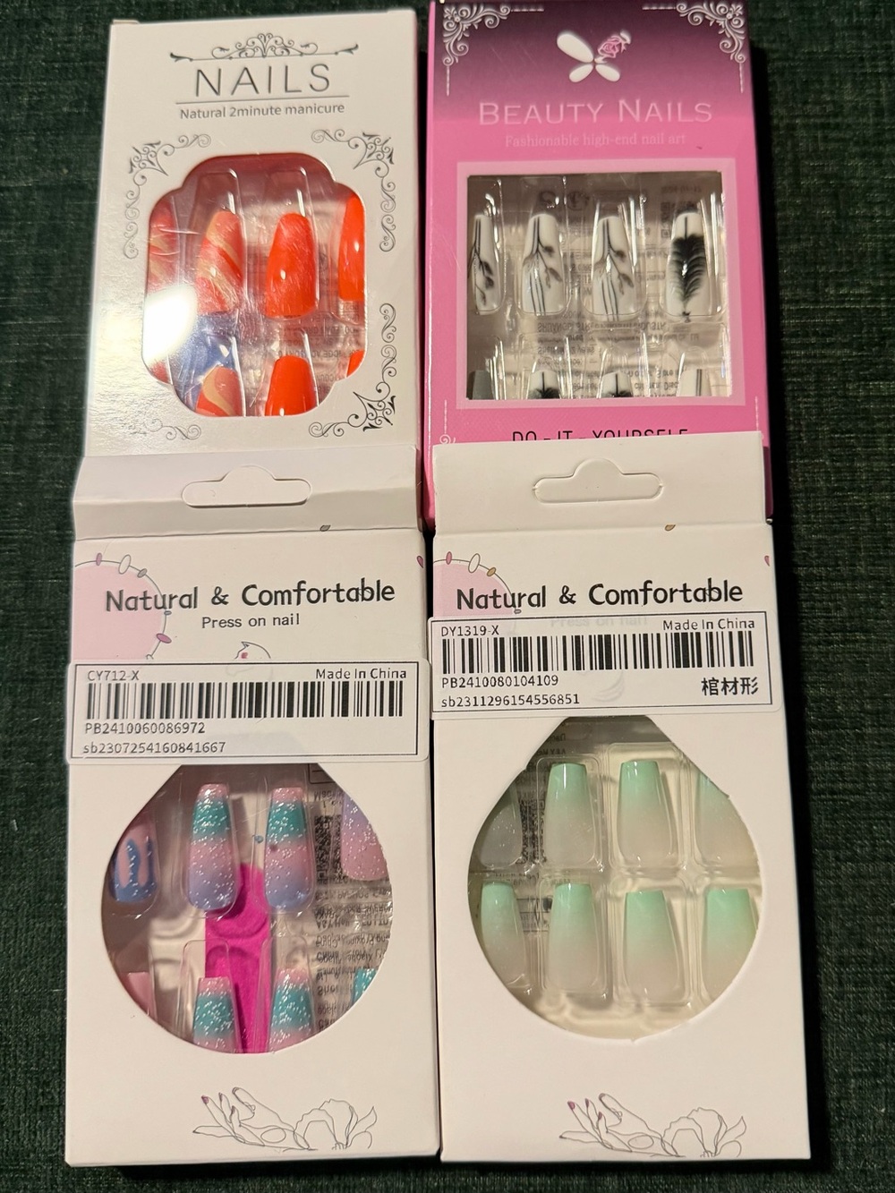 4 packs of fun, stylish long press on nails, new in box